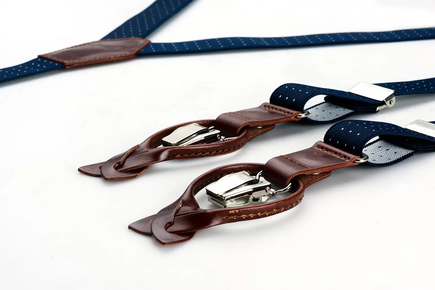 Blauwe bretels van smal elastiek en bruin leer - bretels van het merk Hein Strijker